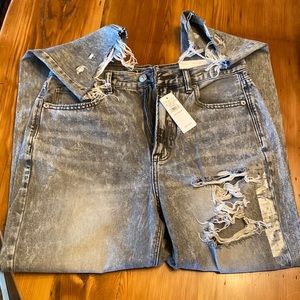 AE Mom jean. Size 8 high rise. Never worn. NWT. Black acid wash and distressed.